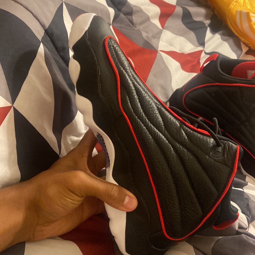Jordan pro strong , size 12 , black and red